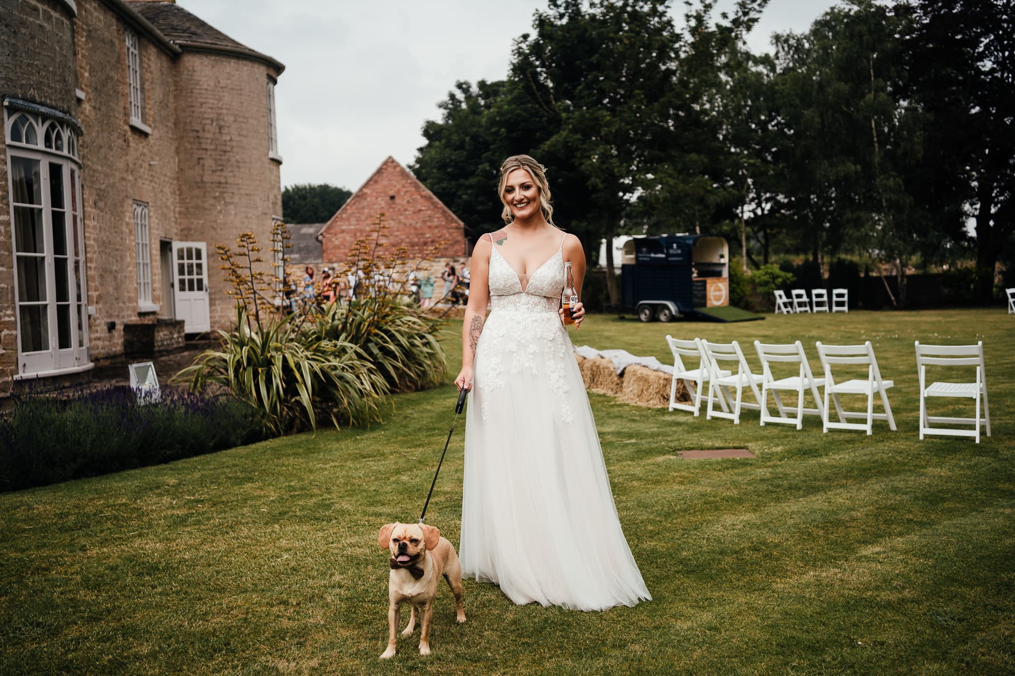 Wedding Photography at Cockliffe House - bride with dog on lead