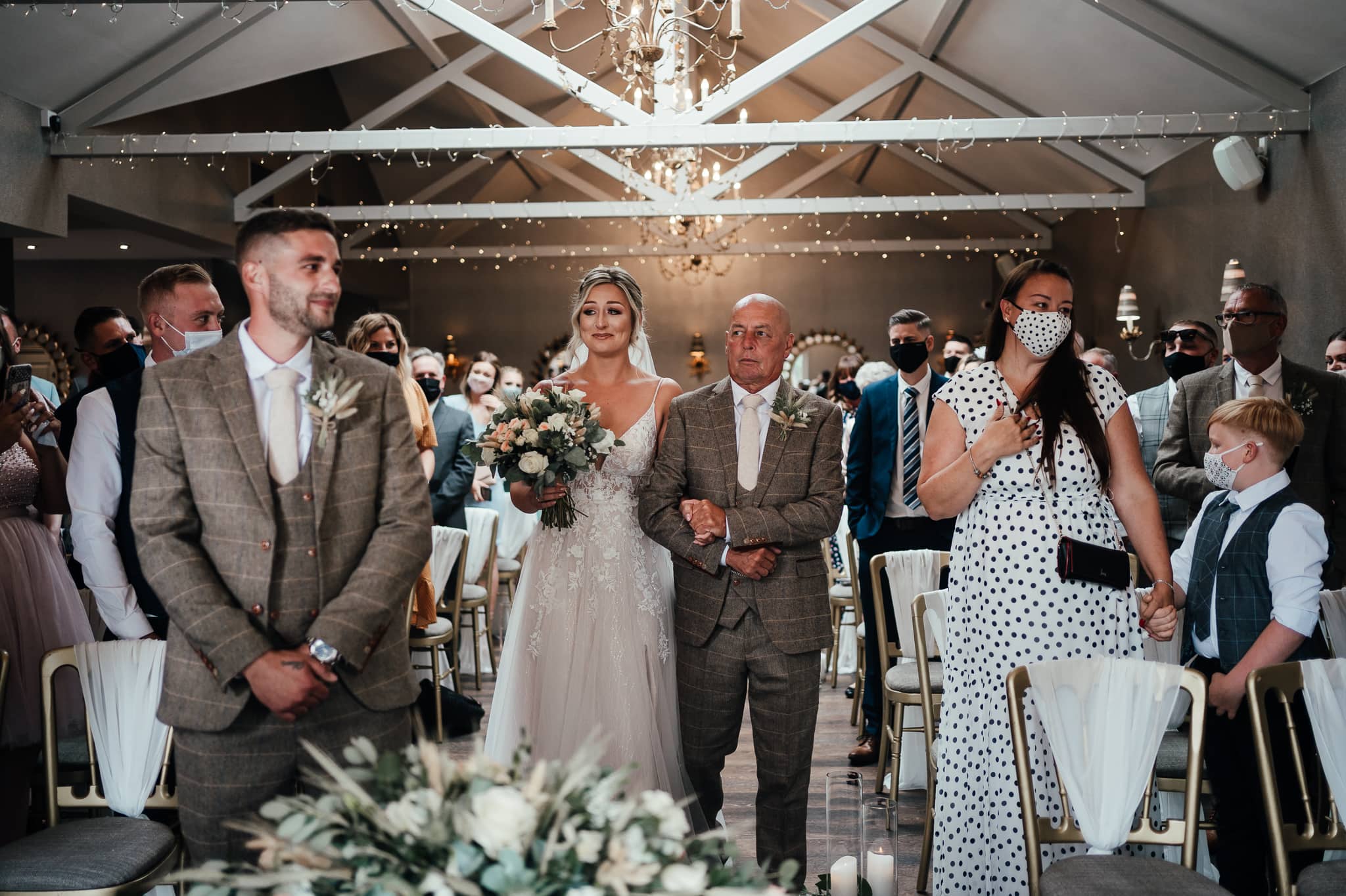 Wedding Photography at Cockliffe House - father of bride walks bride down aisle. Bride close to tears