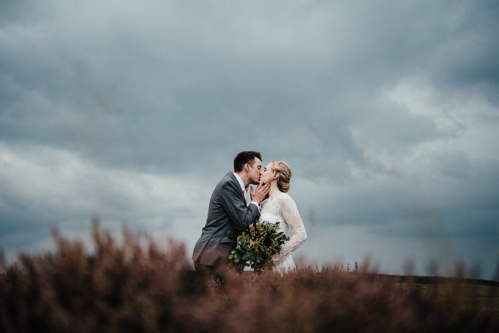 bride and groom portraits at Curbar Edge