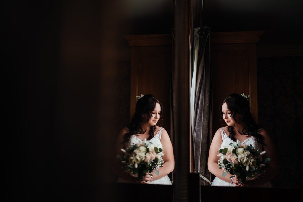 bridal portrait reflection in mirror.